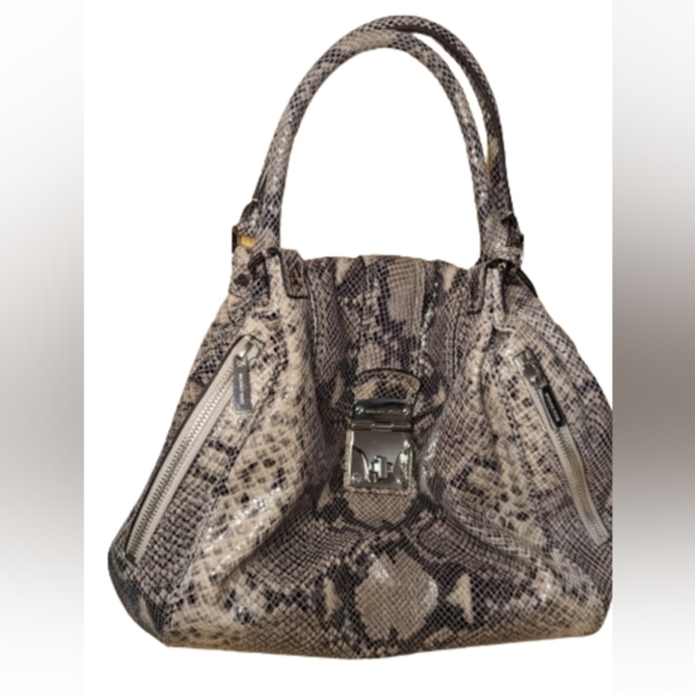 EUC Michael Kors python animal print side zip pockets, flap and clasp turn lock